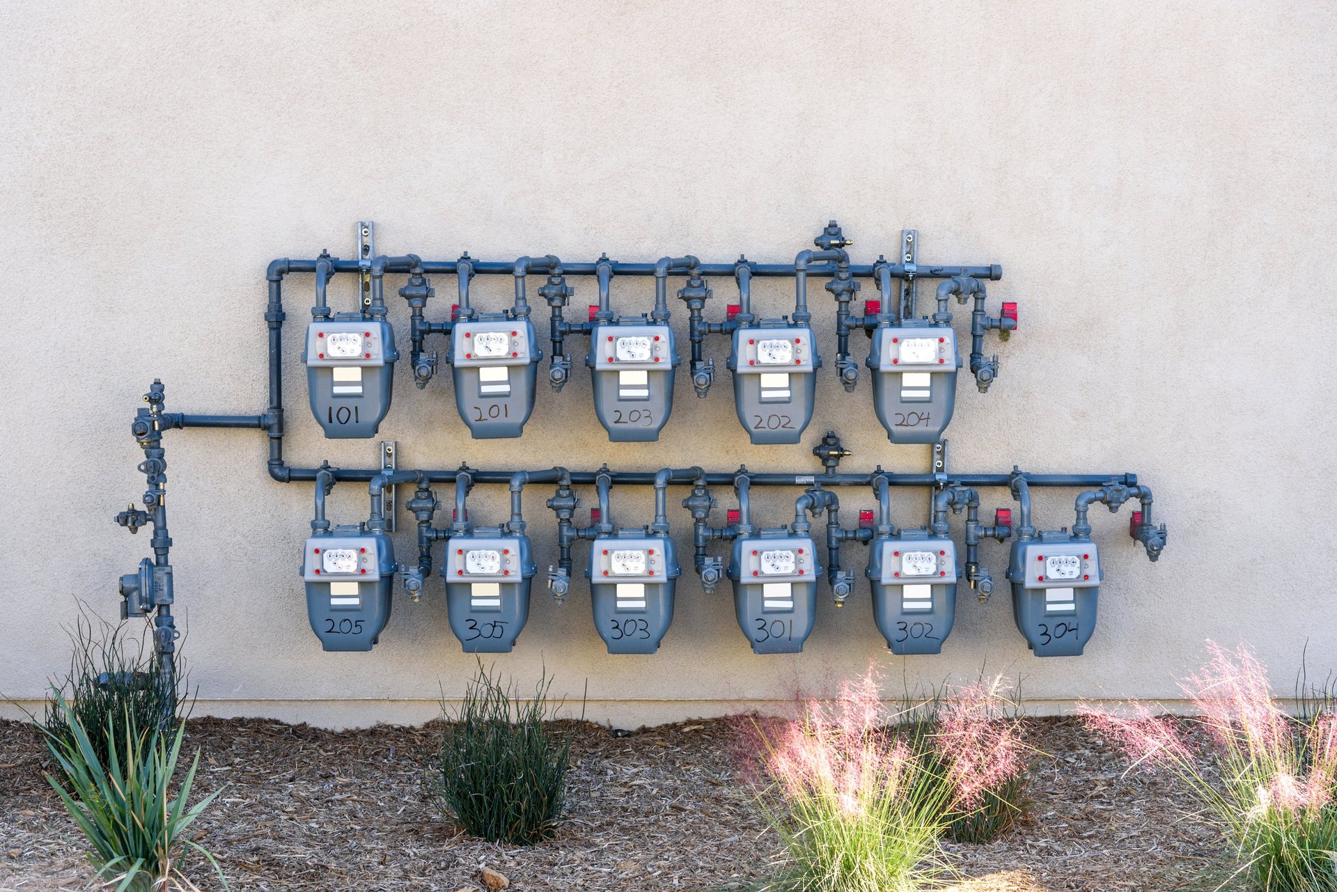 Natural gas meters on building exterior