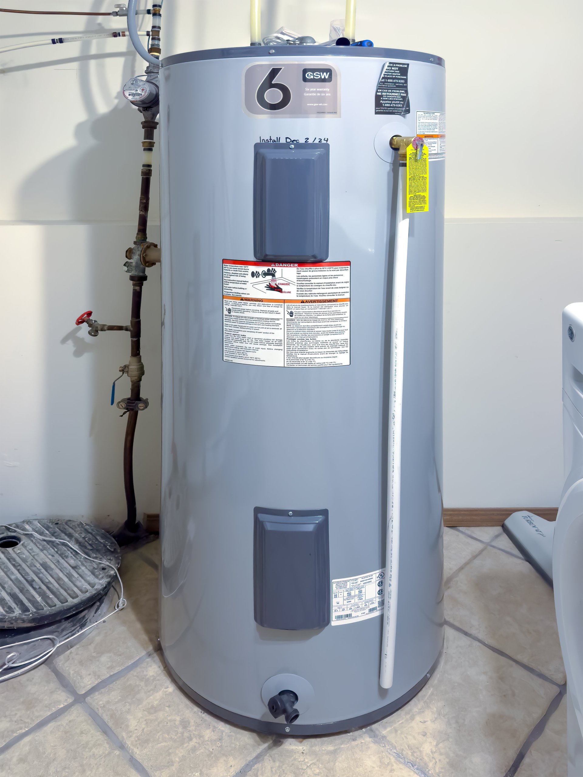 Residential water heater installation in basement
